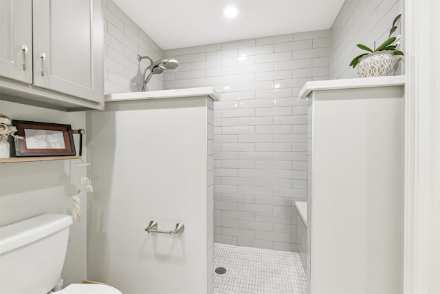 full bathroom with recessed lighting, a walk in shower, and toilet