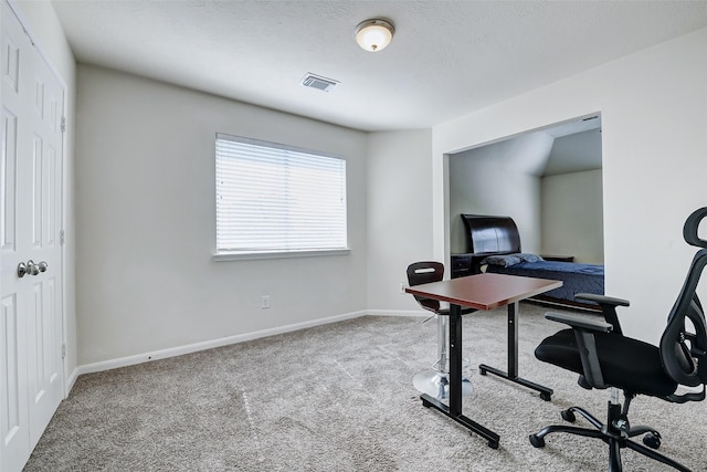 carpeted office with baseboards