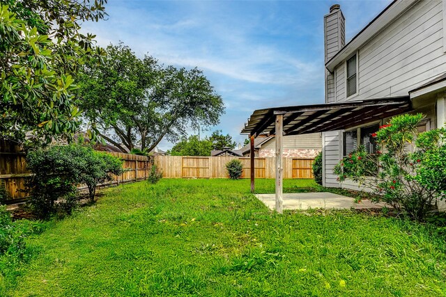view of yard with a patio area