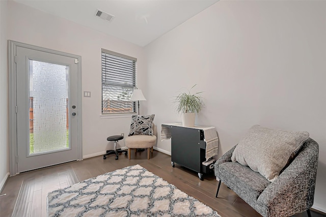 27946 Western Creek Ct, Katy, TX 77494 - living area featuring baseboards, wood finished floors, and visible vents