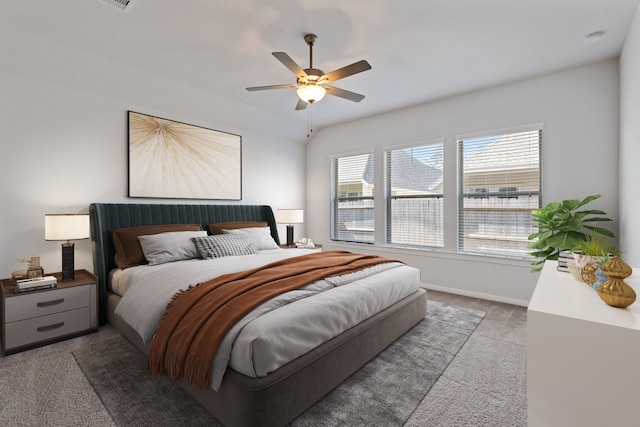 bedroom with carpet flooring, baseboards, and ceiling fan