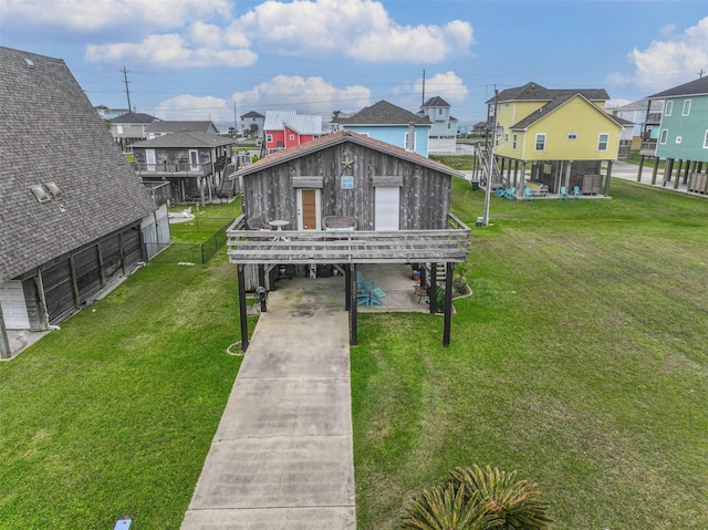 23001 Fresca St, Galveston, TX 77554 - dock with a residential view and a yard