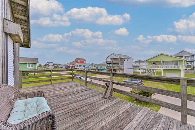 23001 Fresca St, Galveston, TX 77554 - wooden terrace featuring a residential view