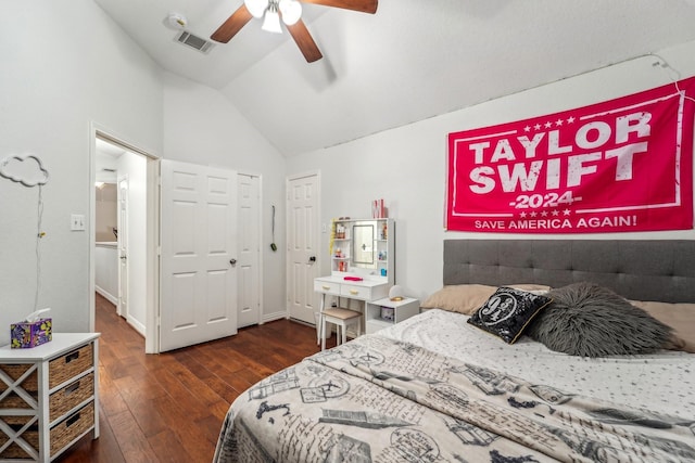 bedroom featuring vaulted ceiling, wood-type flooring, a ceiling fan, and a closet