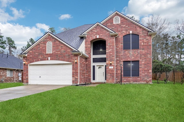 traditional-style house with fence, a shingled roof, a front lawn, driveway, and brick siding