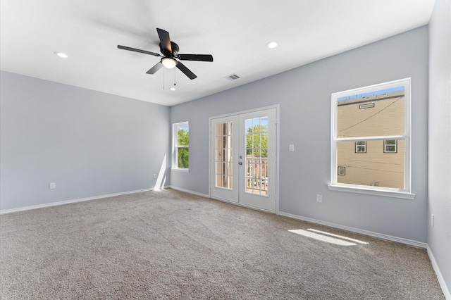 1215 E 34th St Unit A, Houston, TX 77022 - carpeted spare room featuring ceiling fan, french doors, and recessed lighting