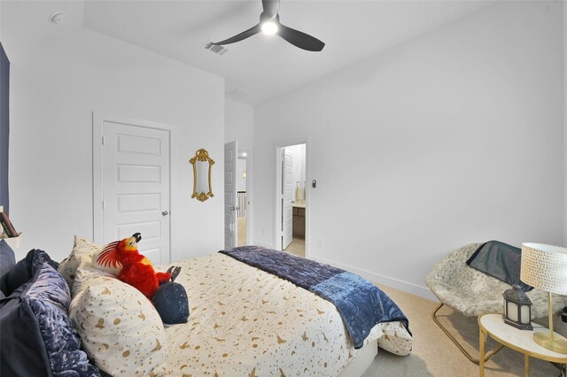 bedroom featuring ceiling fan, light carpet, visible vents, and baseboards