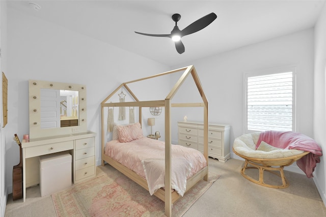bedroom featuring light colored carpet and ceiling fan