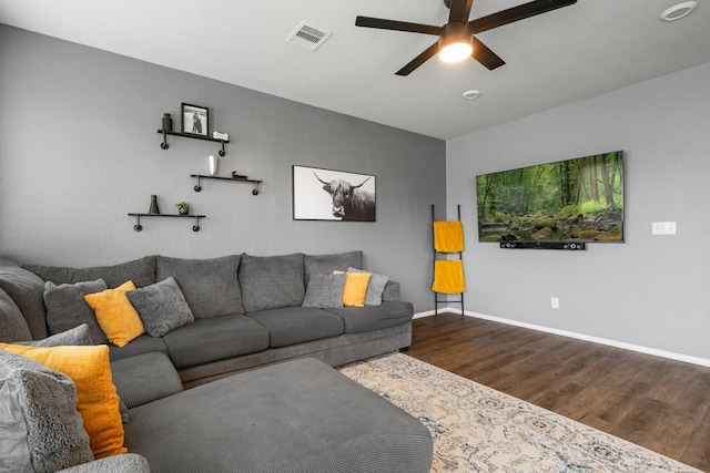 1962 Briar Grove Dr, Conroe, TX 77301 - living room with dark wood-style floors, a ceiling fan, and baseboards