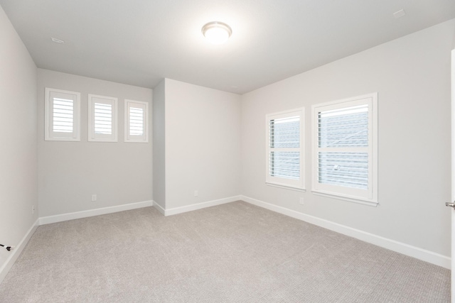 4827 Highland Stream Ct, Fulshear, TX 77441 - empty room with baseboards and light colored carpet