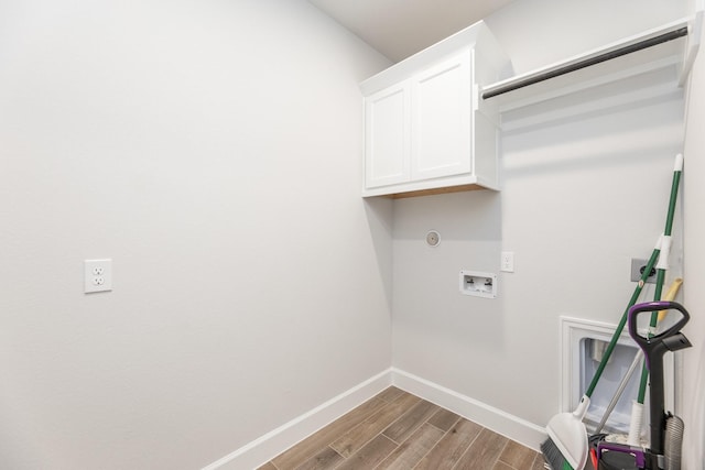 4827 Highland Stream Ct, Fulshear, TX 77441 - washroom with cabinet space, washer hookup, baseboards, and wood finished floors