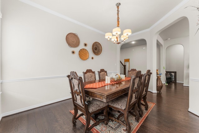 11134 Honeysuckle Haven Dr, Cypress, TX 77433 - dining space featuring arched walkways, baseboards, crown molding, and dark wood-style floors