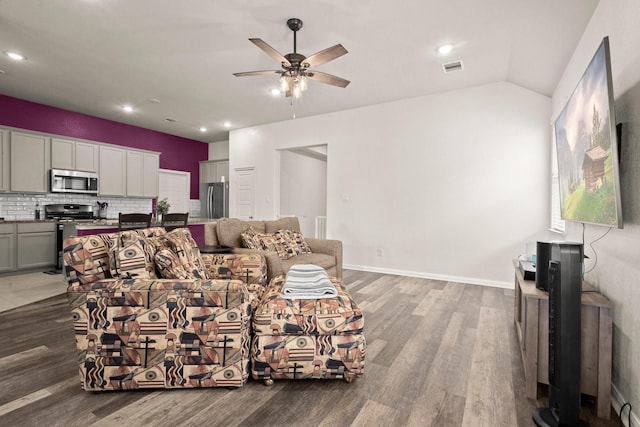 16231 Westley Ridge Dr, Hockley, TX 77447 - living room featuring ceiling fan, wood finished floors, recessed lighting, and lofted ceiling