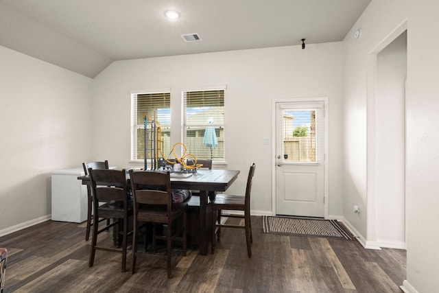 16231 Westley Ridge Dr, Hockley, TX 77447 - dining space with wood finished floors, baseboards, and lofted ceiling
