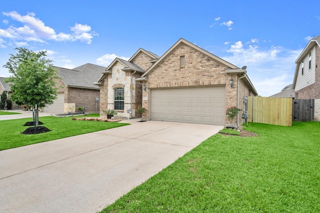 16231 Westley Ridge Dr, Hockley, TX 77447 - view of front of home with brick siding, a garage, concrete driveway, and roof with shingles