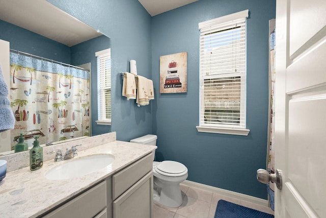 16231 Westley Ridge Dr, Hockley, TX 77447 - bathroom featuring plenty of natural light, tile patterned floors, toilet, and vanity