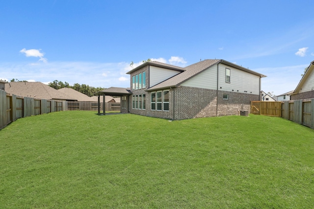 21806 Gateway Arch Dr, Porter, TX 77365 - back of house featuring a gazebo, a fenced backyard, and brick siding