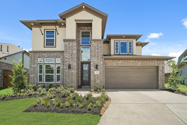 21806 Gateway Arch Dr, Porter, TX 77365 - view of front of property featuring stucco siding, driveway, brick siding, a garage, and a front yard