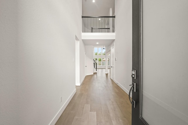 21806 Gateway Arch Dr, Porter, TX 77365 - entryway featuring wood finished floors and a high ceiling