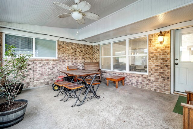 view of patio / terrace featuring a ceiling fan and outdoor dining area