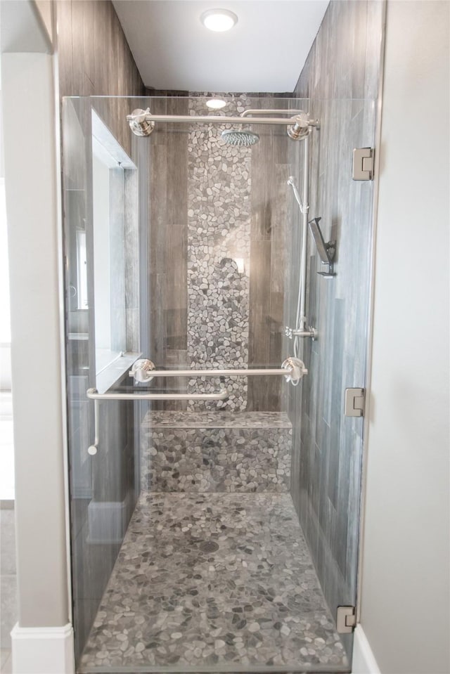full bathroom with a stall shower