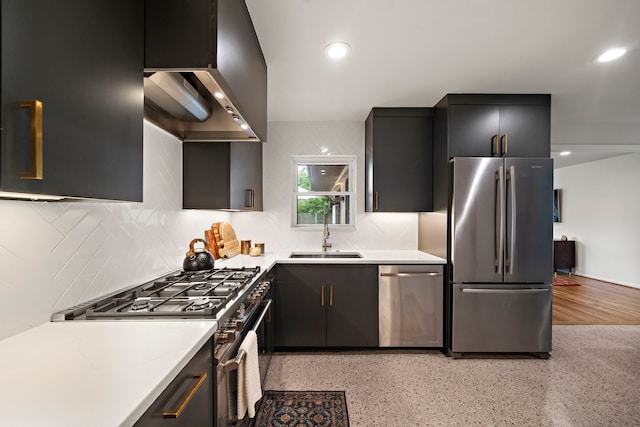 5301 Nina Lee Ln, Houston, TX 77092 - kitchen with stainless steel appliances, a sink, wall chimney exhaust hood, decorative backsplash, and recessed lighting