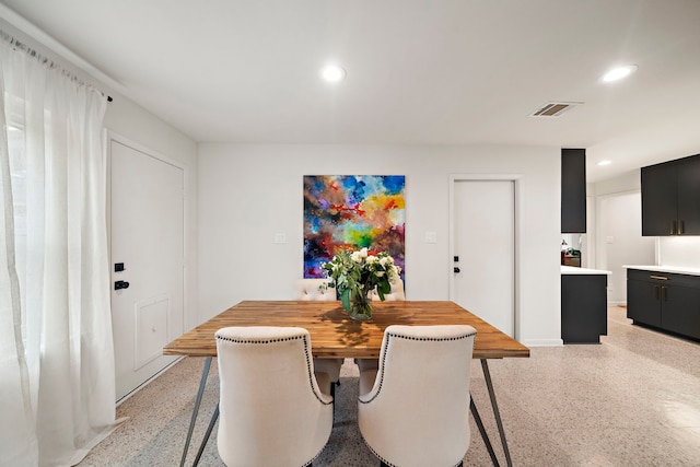 5301 Nina Lee Ln, Houston, TX 77092 - dining area with dark aggregate flooring and recessed lighting