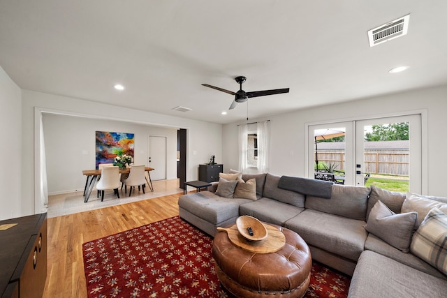 5301 Nina Lee Ln, Houston, TX 77092 - living area featuring light wood finished floors, recessed lighting, french doors, and a ceiling fan