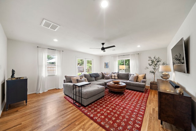 5301 Nina Lee Ln, Houston, TX 77092 - living room featuring light wood-style flooring, plenty of natural light, recessed lighting, a ceiling fan, and baseboards