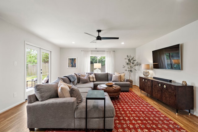 5301 Nina Lee Ln, Houston, TX 77092 - living room featuring light wood-style flooring, a ceiling fan, recessed lighting, and baseboards