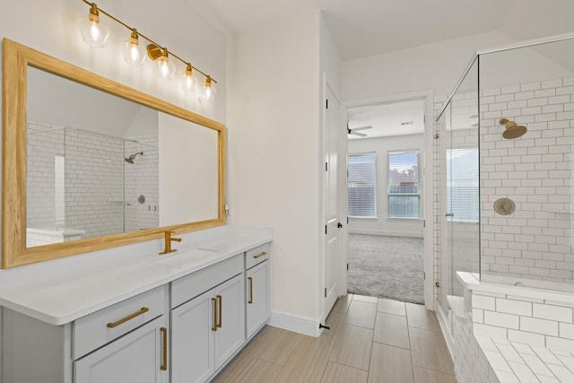 10021 Preserve Way, Conroe, TX 77385 - bathroom featuring vanity, tiled shower, and ceiling fan