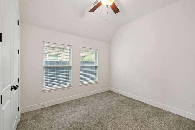 10021 Preserve Way, Conroe, TX 77385 - spare room featuring ceiling fan, vaulted ceiling, baseboards, and carpet