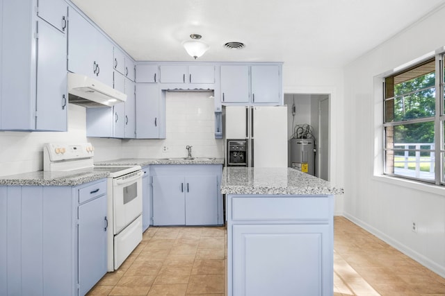 kitchen with a center island, a sink, water heater, white appliances, and under cabinet range hood