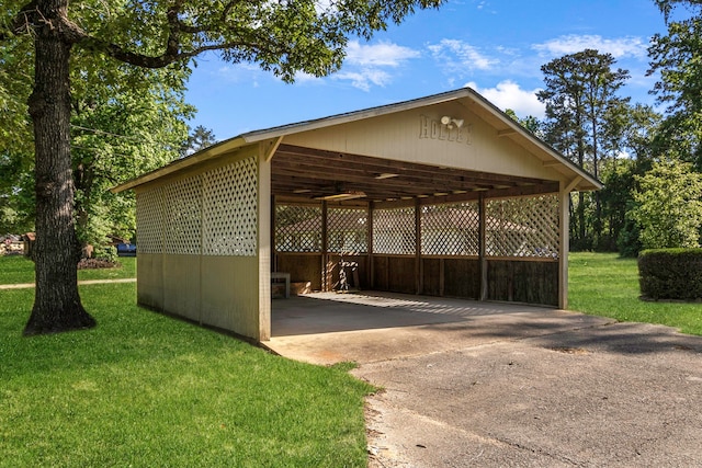 view of vehicle parking with concrete driveway