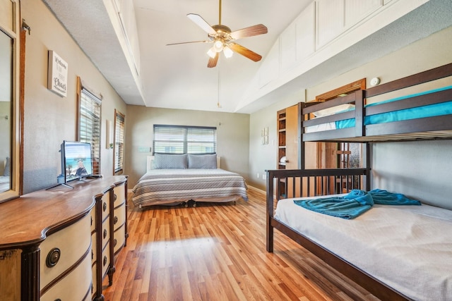 4211 San Jacinto Dr, Galveston, TX 77554 - bedroom featuring high vaulted ceiling, a ceiling fan, and light wood-type flooring