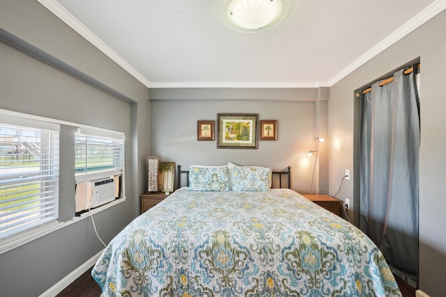 4211 San Jacinto Dr, Galveston, TX 77554 - bedroom with baseboards, crown molding, wood finished floors, and cooling unit