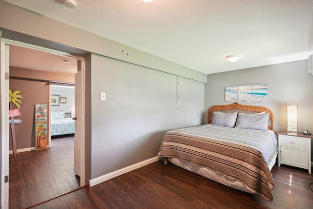 4211 San Jacinto Dr, Galveston, TX 77554 - bedroom featuring wood finished floors and baseboards