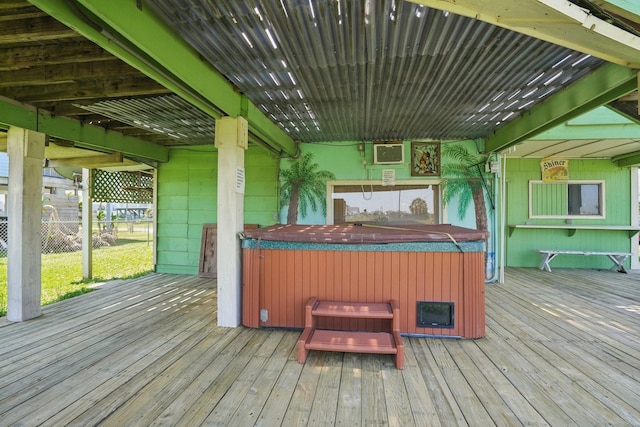 4211 San Jacinto Dr, Galveston, TX 77554 - wooden deck featuring a hot tub
