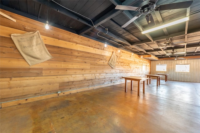 5606 S US Highway 77, Warda, TX 78960 - below grade area with wood ceiling, wooden walls, and a ceiling fan