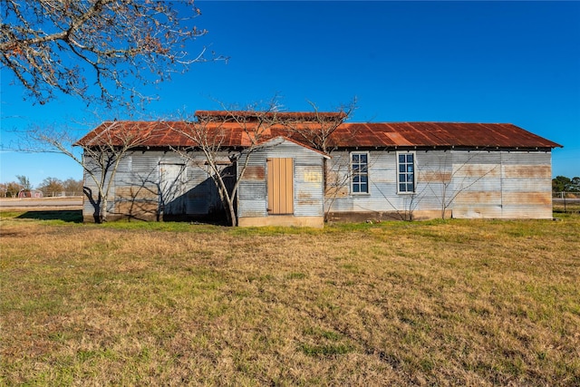 5606 S US Highway 77, Warda, TX 78960 - rear view of house with a yard