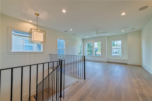 unfurnished room featuring recessed lighting, baseboards, a ceiling fan, and light wood-type flooring