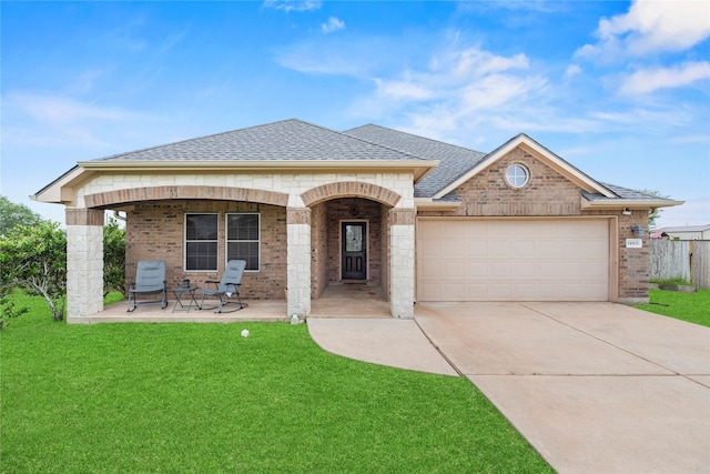 french country home with concrete driveway, a front lawn, a shingled roof, and an attached garage