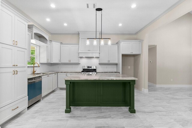 kitchen featuring light stone counters, stainless steel gas stove, dishwashing machine, a sink, and a kitchen island