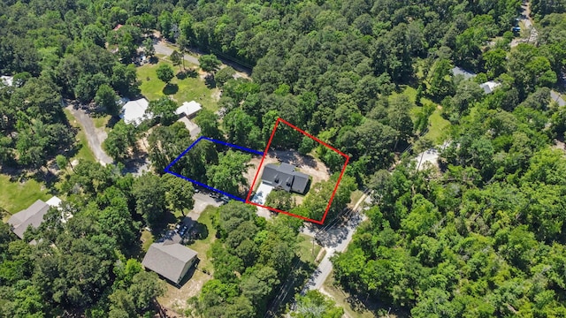 aerial view featuring a forest view