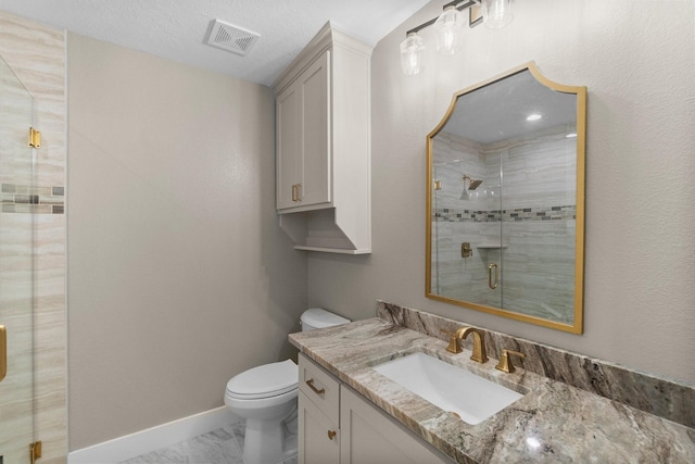 full bathroom with a shower stall, vanity, marble finish floor, toilet, and visible vents