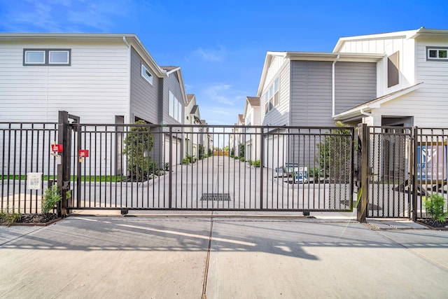 view of gate with fence