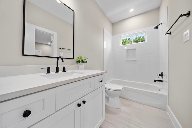 full bathroom with shower / bathing tub combination, vanity, and toilet