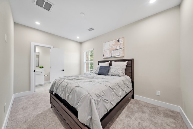bedroom with recessed lighting, visible vents, and light colored carpet