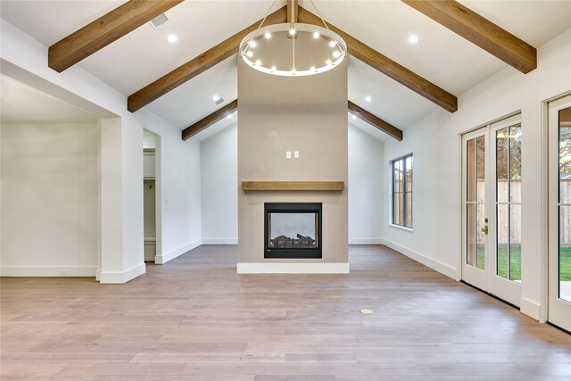 1570 Cheshire Ln, Houston, TX 77018 - unfurnished living room featuring beam ceiling, baseboards, light wood-style flooring, a multi sided fireplace, and recessed lighting