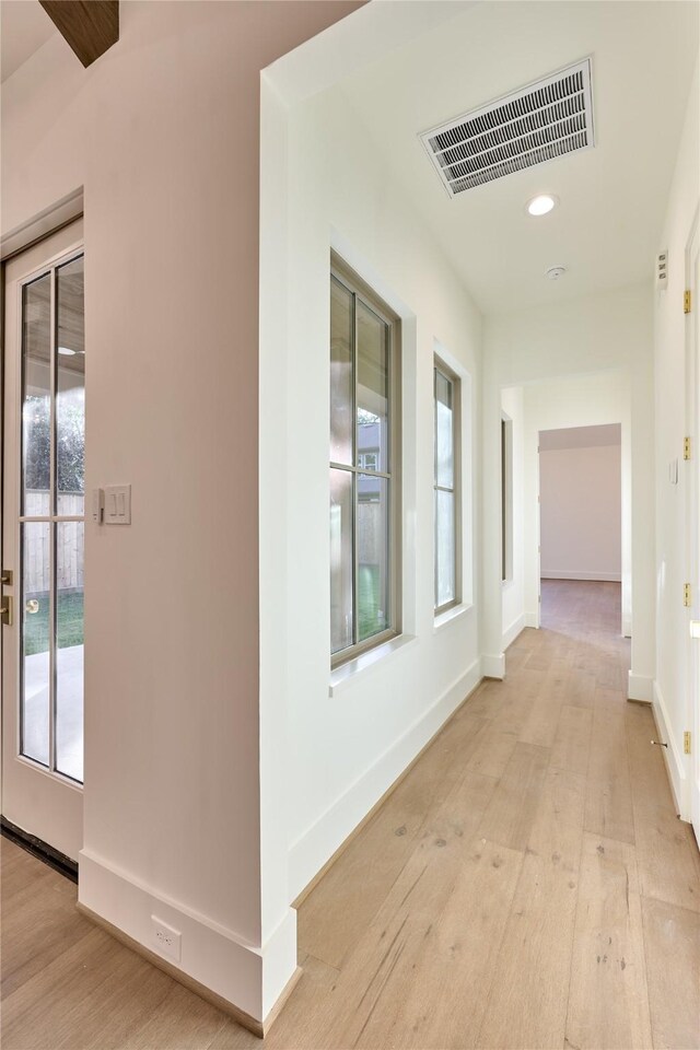 1570 Cheshire Ln, Houston, TX 77018 - corridor featuring plenty of natural light, light wood-style floors, recessed lighting, and baseboards